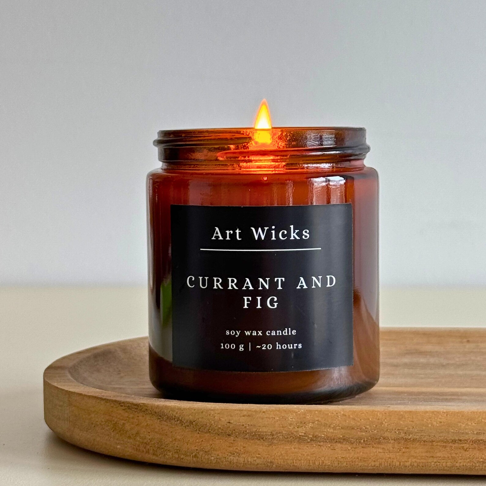 Handcrafted soy candle with rich notes of currant, fig, and cherry. A clean-burning, eco-friendly fragrance that brings warmth and summer sweetness to your home.